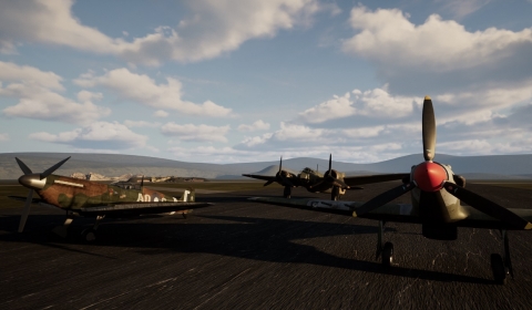 3 World War 2 RAF aircraft parked on a runway