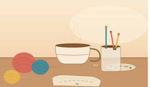 Coffee/tea cup. Red, blue and yellow balls of wool and a jar of pens