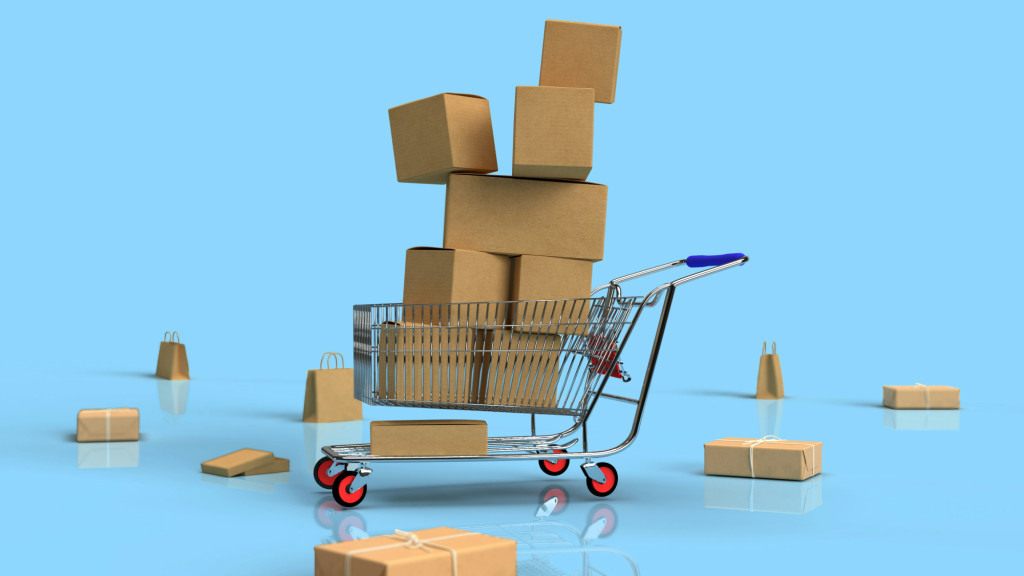 A trolley filled with cardboard boxes.