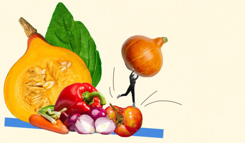 Collage art featuring a tiny monochrome person balancing on a giant tomato while lifting an orange squash over their head, next to an arrangement of fresh vegetables including a halved squash, bell pepper, carrots, and onions.