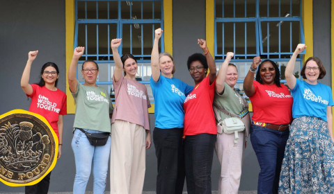 Group photo of staff members from the organisation One World Together