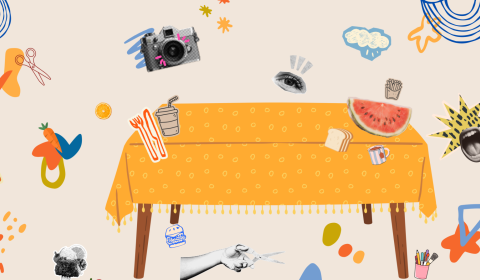 A dinner table displaying cut-out pictures of food and drinks, alongside scissors, demonstrating the process of making a collage.