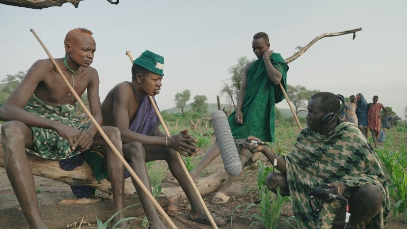 Milisha interviewing members of the Mursi community