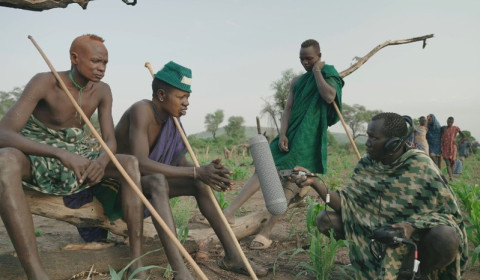 Milisha interviewing members of the Mursi community