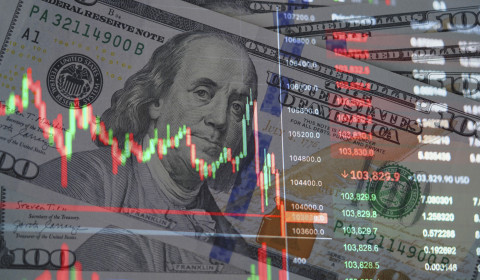 Image of stock market graphs, overlaid over images of bank notes