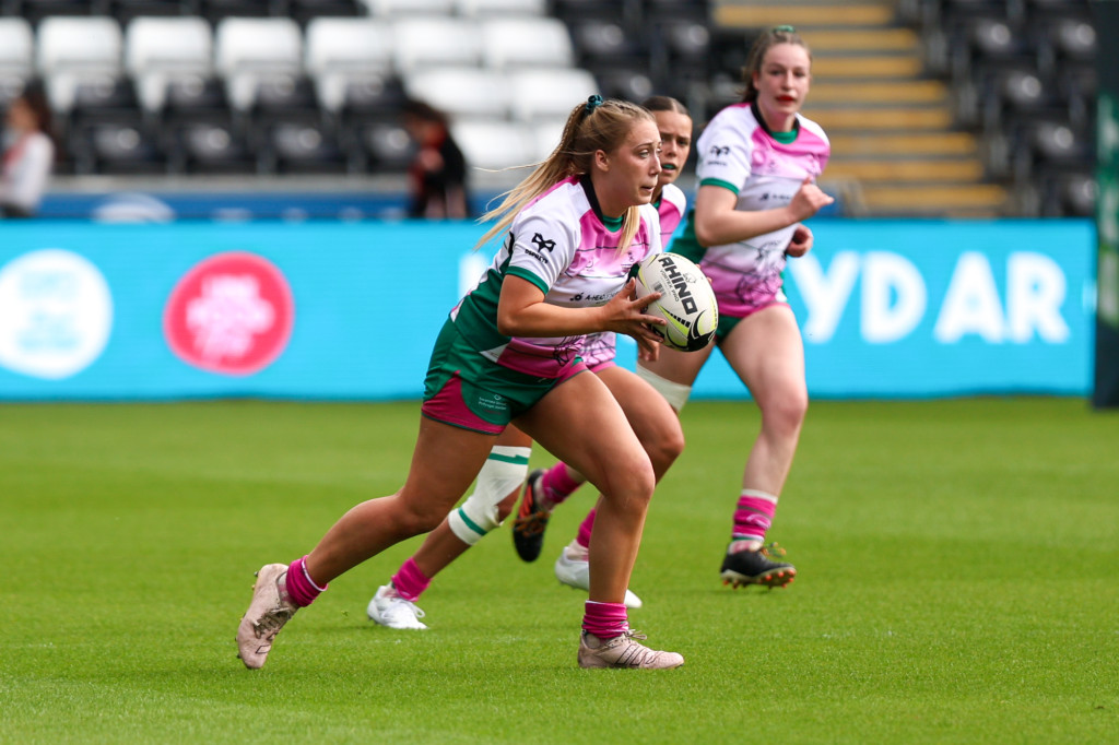 An image of women playing rugby.