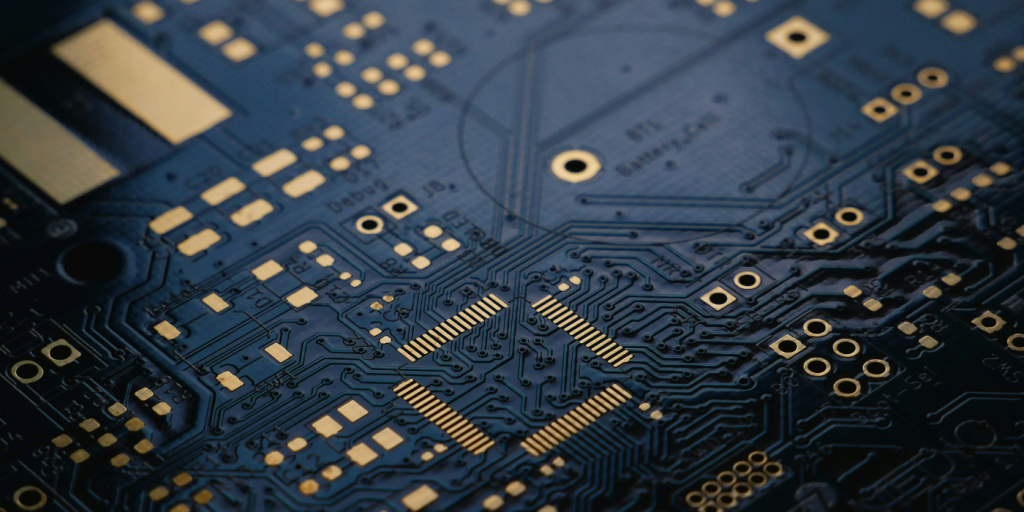 Image of a circuit board in black and gold