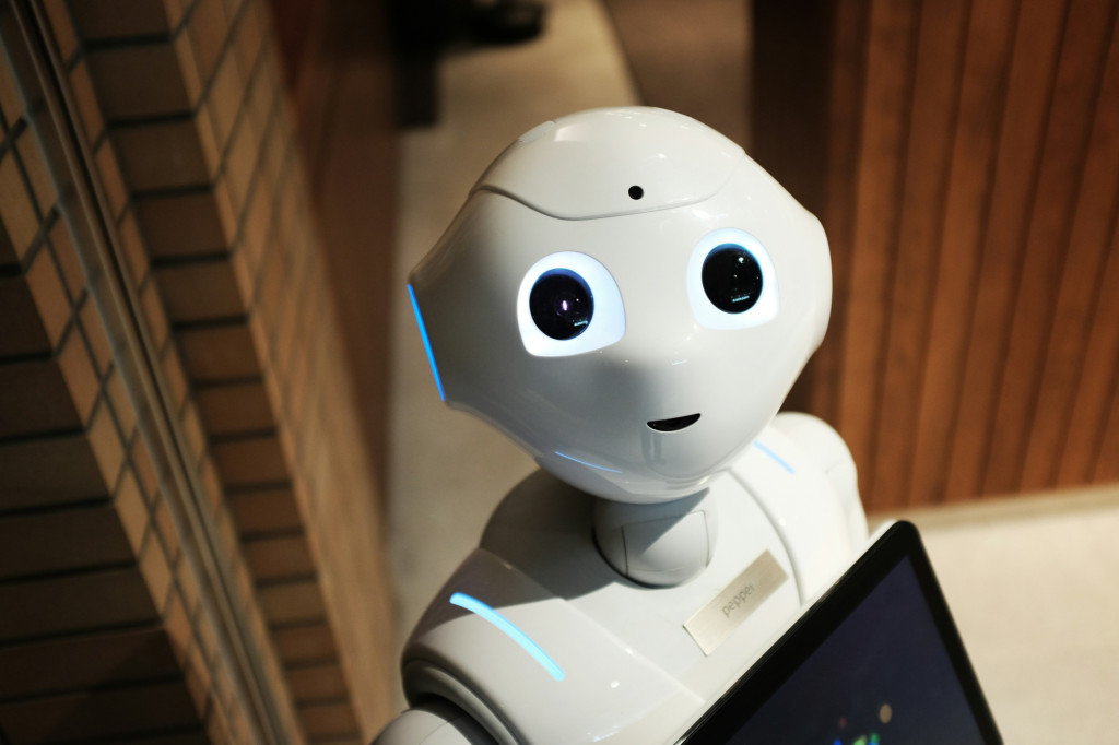 A robot with a tablet computer.