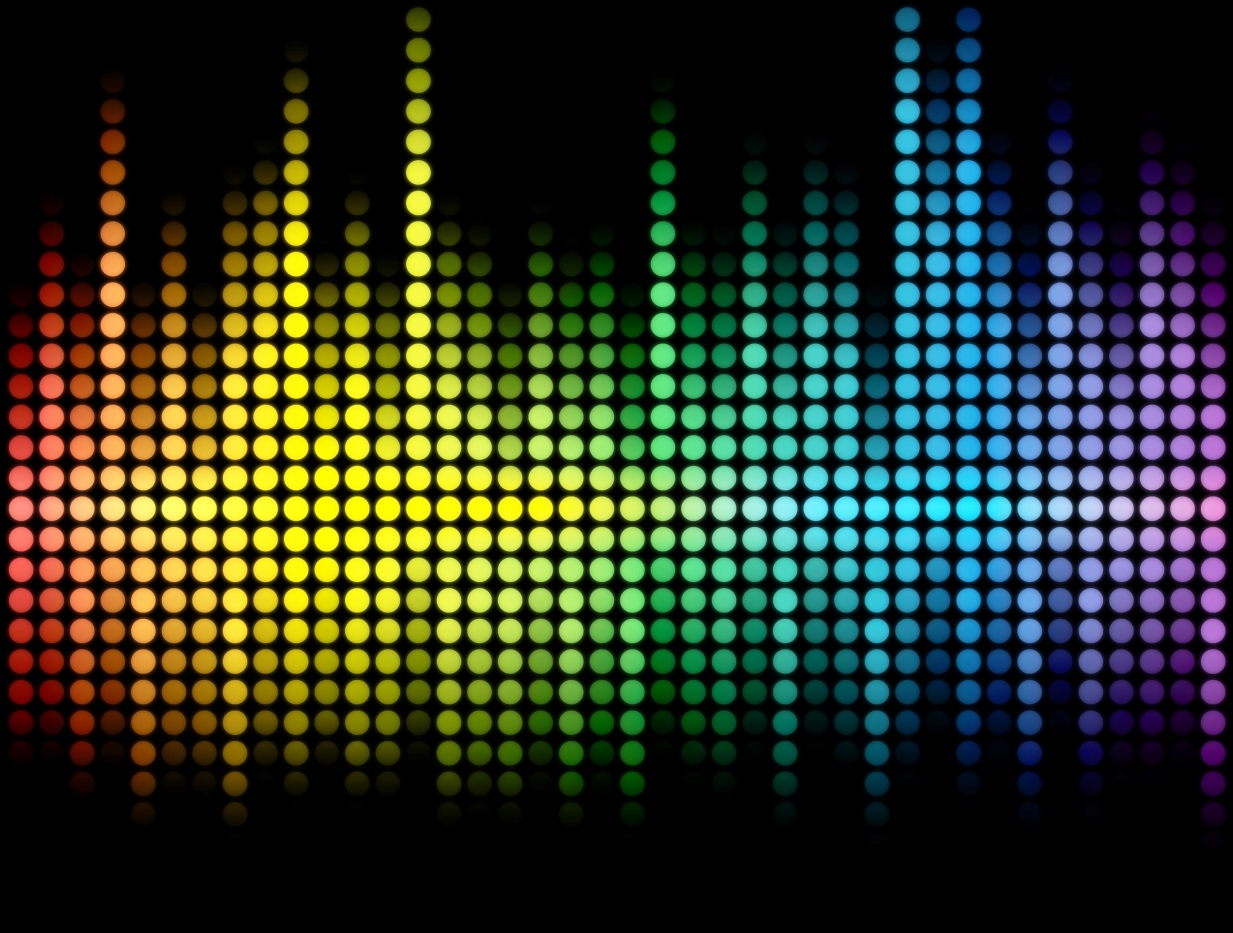 The picture shows a sound wave in a rainbow colours against a black background.
