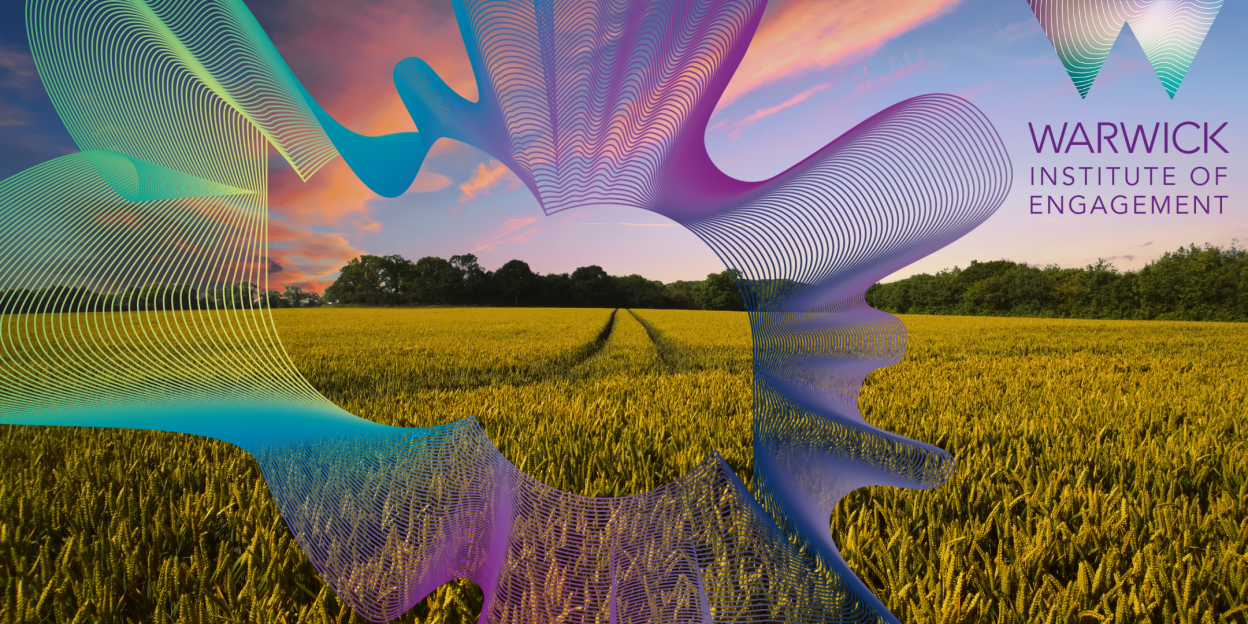 A wheat field with a colourful soundwave graphic superimposed