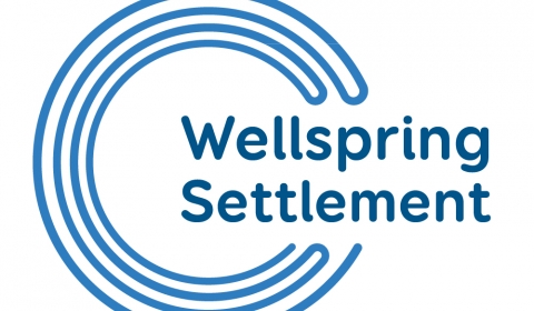 Wellspring Settlement logo